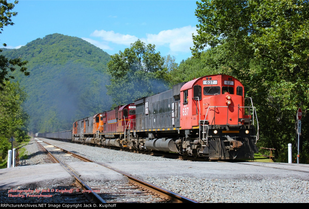 WNY&P 637, leads a southbound DFT at Reason Lane, near Huntley, Pennsylvania. July 9, 2011. 